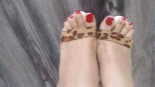 Her stiletto heels dangle from her feet and sway up and down (8)