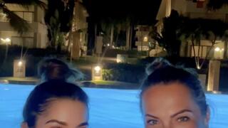 Hot girls smoking cork 100s at night in the pool!