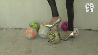 Soccer balls under metal heels 7