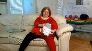 Bbw mature redheaded Nurse Vicki Blows up inflatable Snowman for you! Mp4
