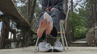 Sneakers Off Outdoors — Barefoot Walk and Dirty Heels Close Up