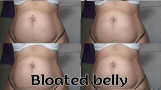 My belly is swollen and ready to burst... I'm teasing you with my full stomach.