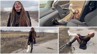 Nastya is walking on crutches with a broken leg in a cast