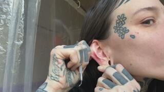 ear blackhead and wax scrape