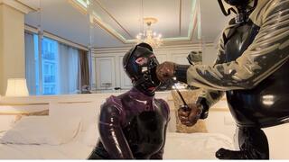 Rubbermissy in Rubberdoll waiting for her owner in full latex catsuit and ring gagged to blowjob