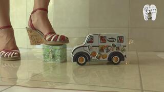 Tin toys under wedge sandals