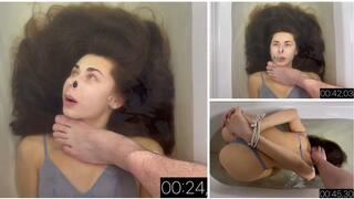 Practicing holding her breath underwater face up and face down (custom video)