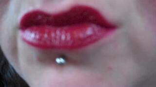 Sarena puts on lipstick