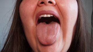 Tongue on camera - close-up