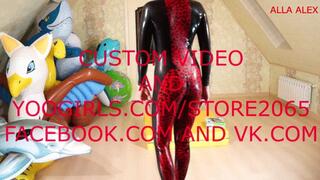 Alla destroys ten plastic bags and wears a latex catsuit with high heels