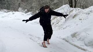 Girl on stilettos walking on ice, high heels on snow, high heels sliding, slippery stilettos, strappy high heels on ice, high heels sandals walking on ice
