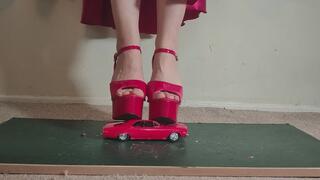 Giantess Lily Kink toy car crush of a 67 Chevelle SS in big mega red heels and stomping the bits in a box close ground view
