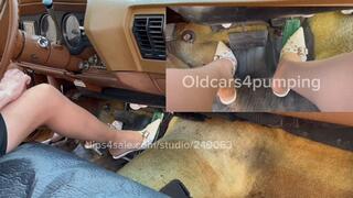 White high heeled mules showing my Buick who’s boss! REVVING IT!