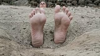 Buried on the beach with only my feet and head outside, my soles are tickled a lot (C3)