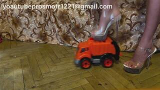 Nastya in sexy heels - tramples and crushes a car with all her weight, steps on it and destroys it, hard crush fetish, foot fetish, heels, legs, ass