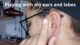 Playing with my ears and lobes