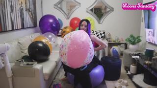 Blowing up pink beach ball and bouncing on yoga ball