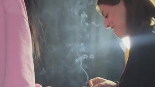 SEPTEMBER AND LOVE THEY ARE LIGHTING CIGARETTES TOGETHER