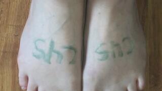 GREEN LIGHT BEAM ON BLONDE HARDWOOD FLOOR FROM CAMERA LIGHT TURNED ON