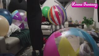 Blowing up jumbo colorful beach ball