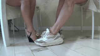 Footsie sandals and sneakers undet table