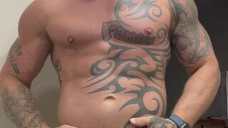 Tatted Viking flexes while stroking for you