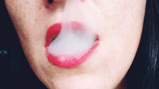 Smoking with red lips for your pleasure