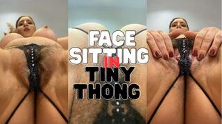 Facesitting in a Tiny Thong