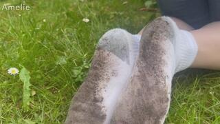 Amelie gets her Hanes white socks dirty while gardening