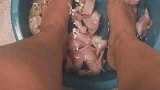 Warm water, rose petals, and my feet.