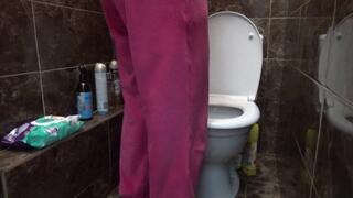 sit on the toilet with relief