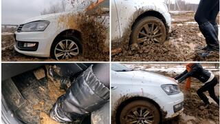 Car stuck in deep soft first mud in Volkswagen