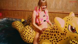Alla has a hot fuck with a big inflatable cheetah in the pool and wears an inflatable vest for safety!!!