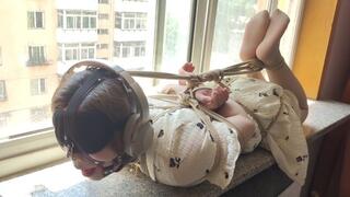 xr242-hogtied bondage and headphone fetish