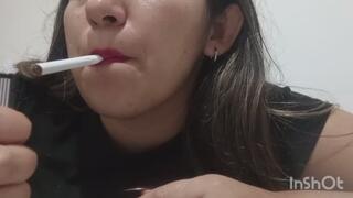 My sexy lips are painted red and I enjoy my cigarette.