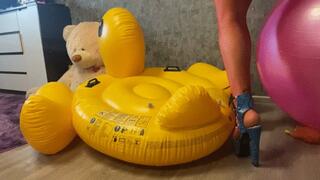 mastrubation girl poping inflatavle duck with heels