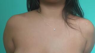 Latina blows bubble gum bubbles