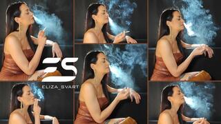 Full clip only nose exhales: smoking in a brown leather dress and boots