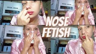 I pick my nose and blow hard through my nose.