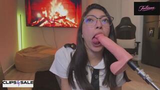 Flight attendant on her knees sucks a large dildo