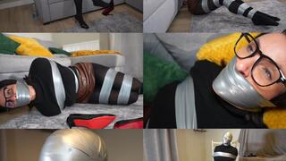 Sarah wild and her big tape bondage escape challenge: tape bound, gagged and tape hooded (wmv)