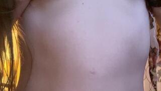 Solo amateur in sheer top and thong plays with her boobs