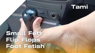 Small feet in flip flops and showing their pronounced arches (4)