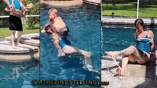 Catherine Sterling gets Tied Poolside by Ben, Thrown in the Water, Dunked, Dragged, Tickled, Tormented & Challenged to Escape her Wet Ropes! Real life bondage first for Catherine, who smiles through every moment! WMV DVD File Format