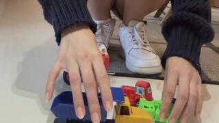 Laura Crushing Toy Cars