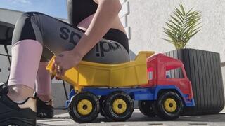 Toy Truck Fart Ride – Gym Outfit Back & Forth Wheel Bending Challenge.