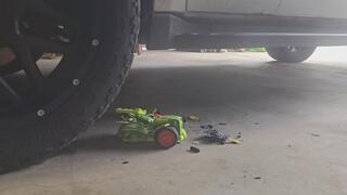 Chrissy running over toy cars