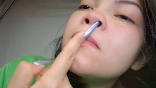 Picking my nose to get my snot out