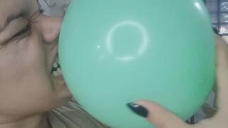 Biting my balloon with all my might