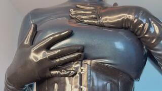 Seductive blonde in a latex outfit